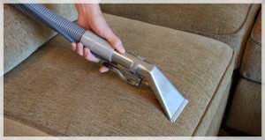 Upholstery cleaning team in action